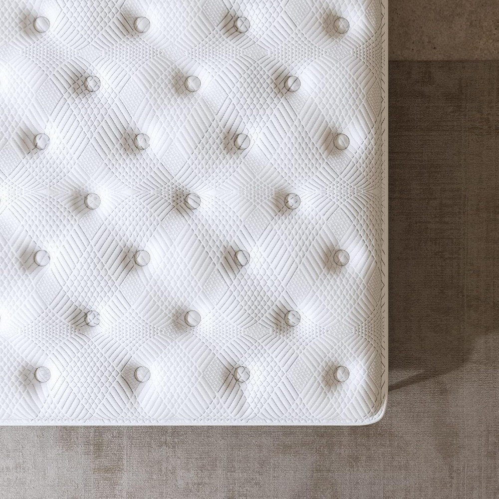 Close-up of tufted fabric and small bumps